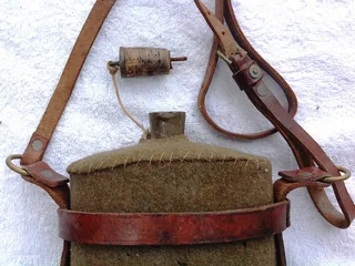 First World War British Army Cavalry felt covered metal water bottle with leather and brass harness