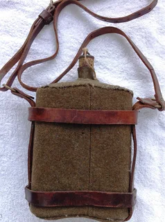 First World War British Army Cavalry felt covered metal water bottle with leather and brass harness