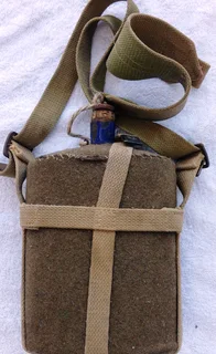 First World War British Army metal and cobalt blue enamel felt covered water bottle with khaki strap