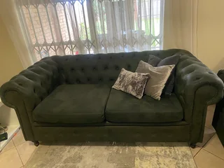 Two seater emerald green couch for sale