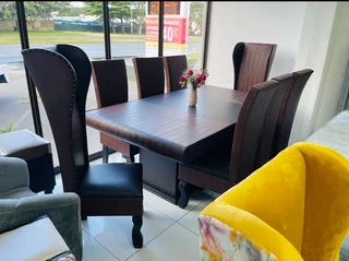 Leather dining room table(8 seater) - laybye arranged