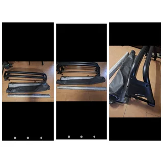 Tonneau cover and roll bar