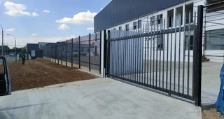 PALISADE FENCING AND GATES