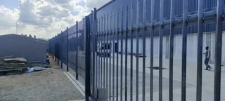 PALISADE FENCING AND GATES