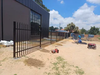 PALISADE FENCING AND GATES