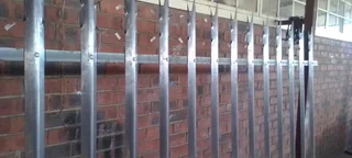 Palisade Fencing, Gates And Paint