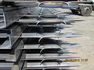 PALISADE FENCING, GATES AND PAINT