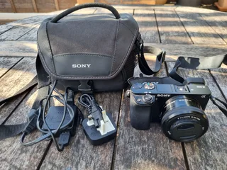 Sony Alpha a6000 Mirrorless Digital Camera 24.3MP SLR Camera with 3.0-Inch LCD (Black) w/16-50mm Pow