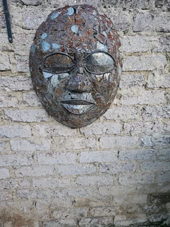 Metal Mask Sculpture