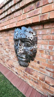 Silver Man Steel Face Sculpture
