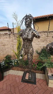 Hand Crafted Metal Female Sculpture