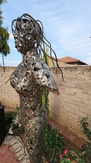 Hand Crafted Metal Female Sculpture