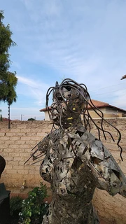 Hand Crafted Metal Female Sculpture