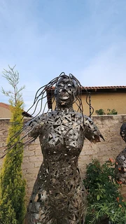 Hand Crafted Metal Female Sculpture