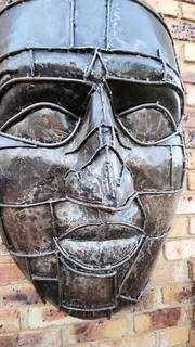 Heavy Metal Face Sculpture
