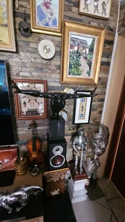 Crouching Man Sculpture on Granite Stand