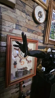 Crouching Man Sculpture on Granite Stand