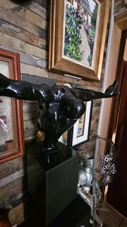 Crouching Man Sculpture on Granite Stand