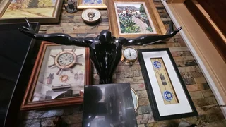 Crouching Man Sculpture on Granite Stand