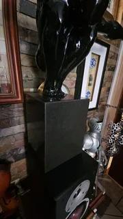 Crouching Man Sculpture on Granite Stand