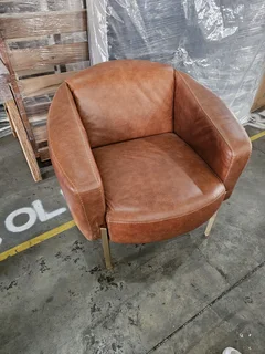 For Sale: Prague Leather Armchair – Vintage TanPre-owned and in excellent condition. Features modifi