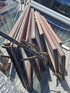 Meranti window frames, hinges and handles.