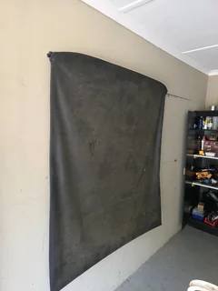 Roll bar and tarpaulin