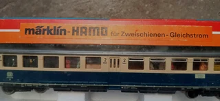 Very rare Märklin two rail direct current suburban trainset complete with figurines