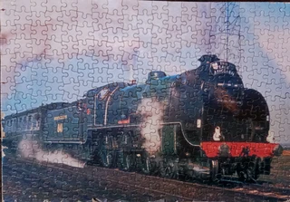 Mounted puzzles of railway scenes