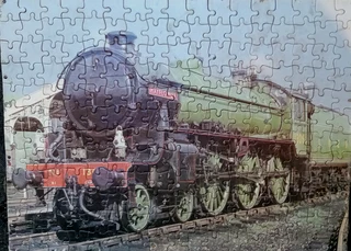 Mounted puzzles of railway scenes