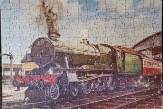 Mounted puzzles of railway scenes