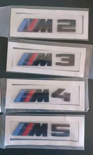 Black BMW Motorsport metal badges emblems.