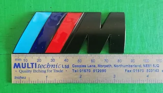 Black BMW Motorsport metal badges emblems.