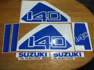 Cowl graphics decals stickers for a Suzuki DT 115 outboard motor
