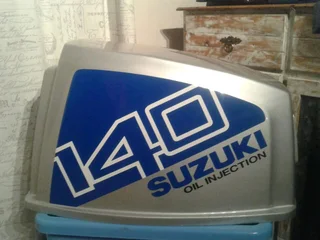 Cowl graphics decals stickers for a Suzuki DT 115 outboard motor