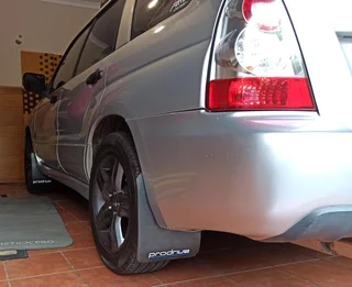 Subaru STI front metal chrome / red grille badge emblem