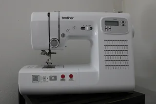 Brother FS60X Heavy Duty Computerised Sewing  Machine and Brother 2504D Overlocker for sale by owner
