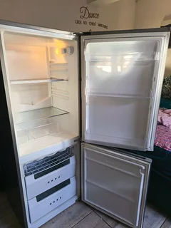 KIC Silver FRIDGE with freezer at the bottom. Just needs a new seal.