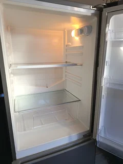 KIC Silver FRIDGE with freezer at the bottom. Just needs a new seal.