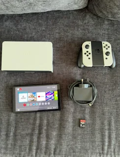 Nintendo Switch OLED (White) + Sniper Elite 4 – Excellent Condition