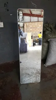 Thin framed arched mirror with stand