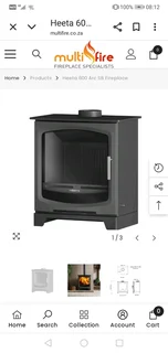 Heeta 600 cast Iron fireplace with stainless steel flue kit.