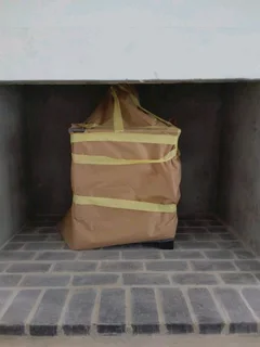 Heeta 600 cast Iron fireplace with stainless steel flue kit.