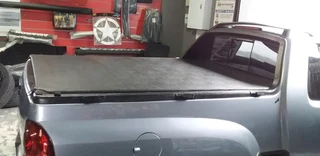 Motorized styling vinyl tonneau covers available clip on type/rope type