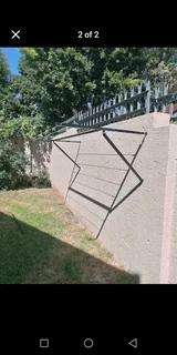 Wall mounted foldable washing lines