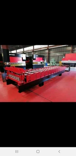 Roof sheet roll forming line for IBR