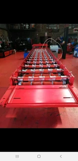 Roof sheet roll forming line for IBR