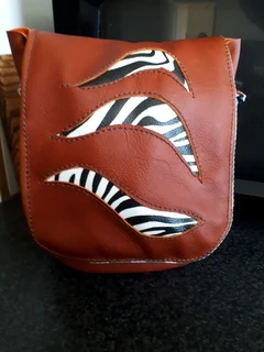 Leather handbag with Zebra stripes on lining