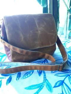 Leather and waxed canvas handbag