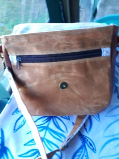 Leather and waxed canvas handbag